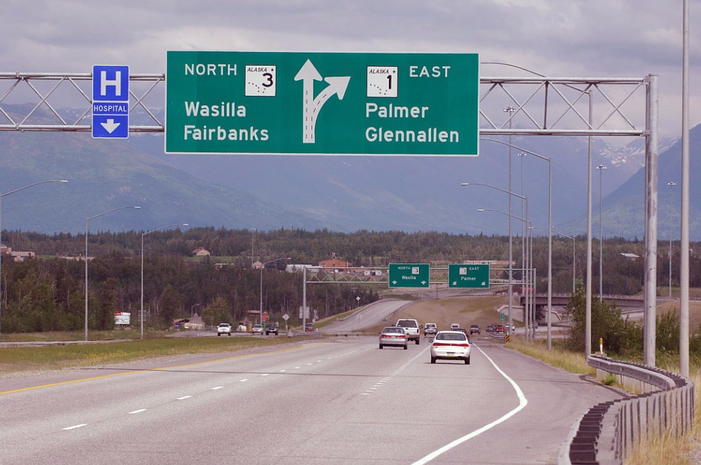 At the Alaska 3/Parks Highway interchange, Alaska 1/Glenn Highway turns east toward Palmer and Tok; Alaska 3 travels north toward Denali National Park and Fairbanks.