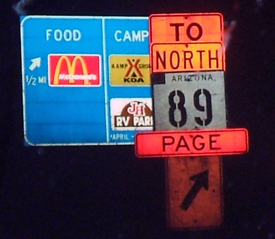 Stenciled highway marker in a construction zone.