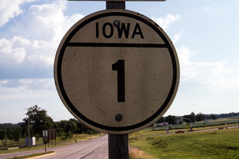 Iowa City. The backs of the infinitely durable cast-iron shields were reused to create retroreflective markers in the late 1940s and 50s.