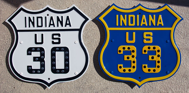 Replicas of 1930s highway markers.