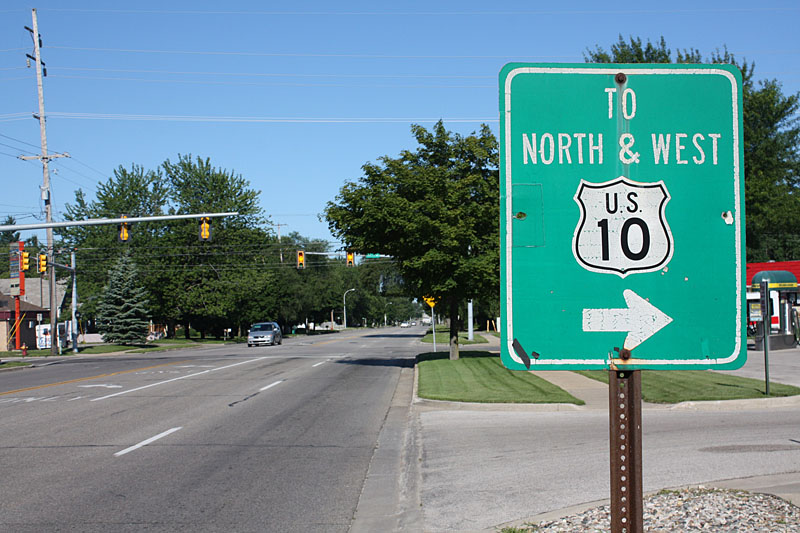 Bay City Road, Midland. <i>In the 1950s, this was route M-20 west from Bay City (instead of originating in Midland as it does today). US 10 came up from Saginaw on what is M-47 today. When the I-75 freeway was built, US 10 was moved to the M-20 position, and the US 10 freeway parallel to the old Bay City Road between Bay City and Midland. So – this oddball was meant to direct traffic from the old road to the new one, less than a mile to the north.</i>