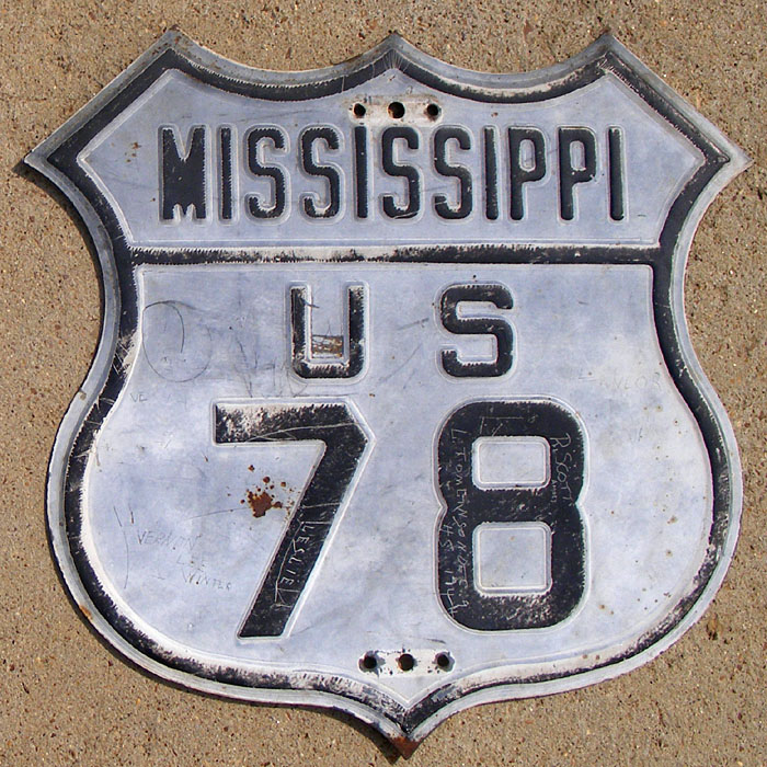This sign was once blue with a white legend. It is not known which paint scheme is older - blue with white, or white with black.