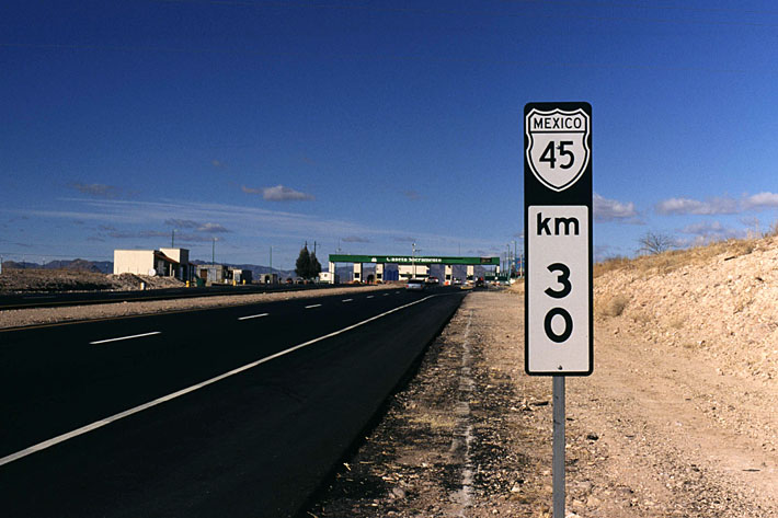 Milepost on tolled part of Mex. 45D near Sacramento. 