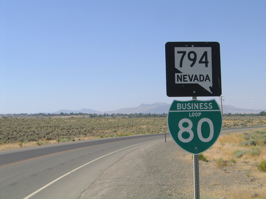 Nevada 794 & Business Loop I-80 shields posted near the Exit 180 interchange of I-80 east of Winnemucca.