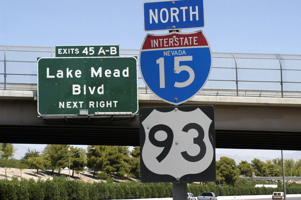 Northbound reassurance shields approaching Exit 45 in Las Vegas. Note early 1960s porcelain guide sign in the background.