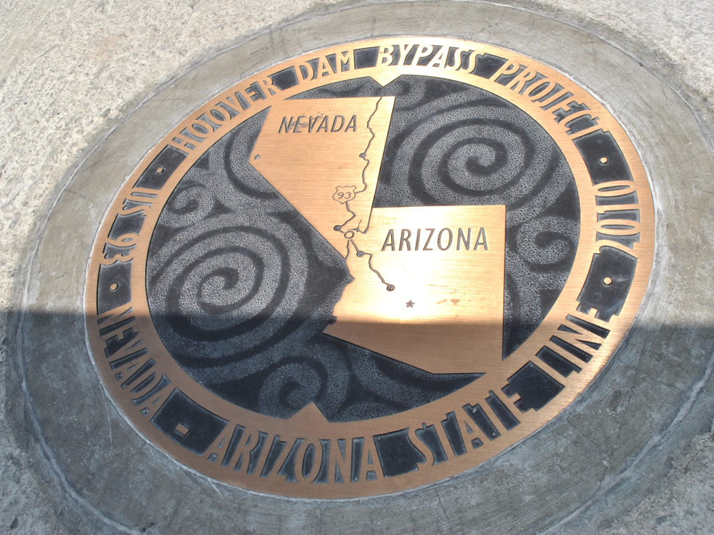 Monument depicting the location of the state line along the walkway on the Mike O'Callaghan - Pat Tillman Memorial Bridge (U.S. 93).