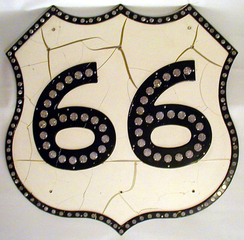 Genuine US-66 sign, intended for green guide sign use. 48x48 inch size. Beware of imitations made, after the fact, using surplus ODOT shield parts.