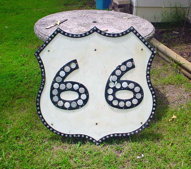 Genuine US-66 sign, intended for green guide sign use. 36x36 inch size. Beware of imitations made, after the fact, using surplus ODOT shield parts.